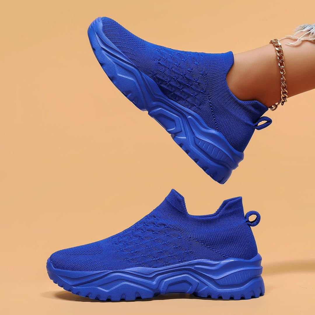 A person wearing Unisex Ortho Cloud Comfort Slip-On Shoes, demonstrating their easy wear and comfort.