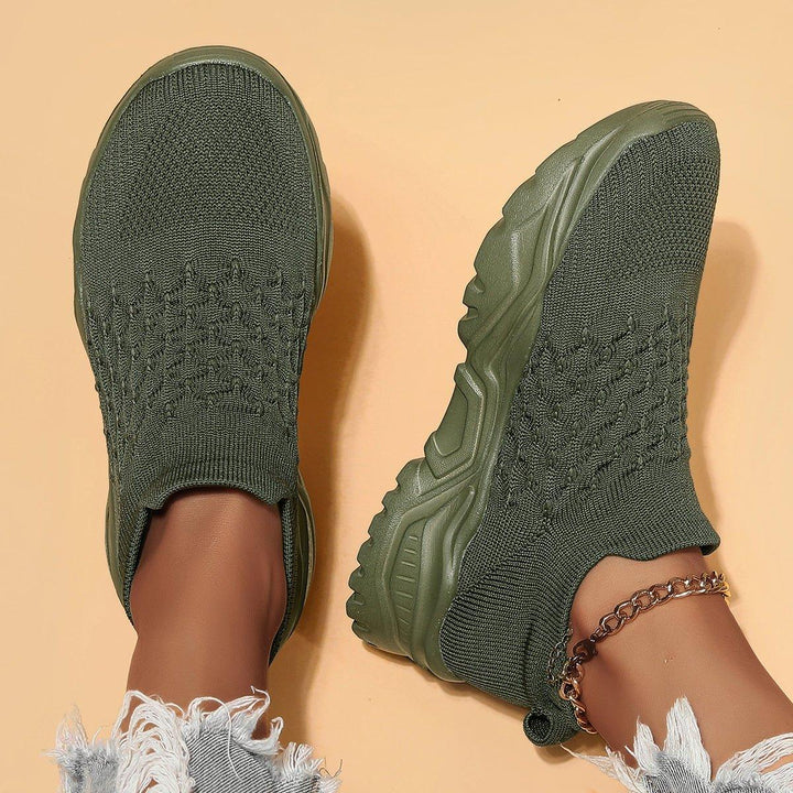 Olive green Ortho Cloud Slip-On Shoes on a natural background, soft lighting, casual look