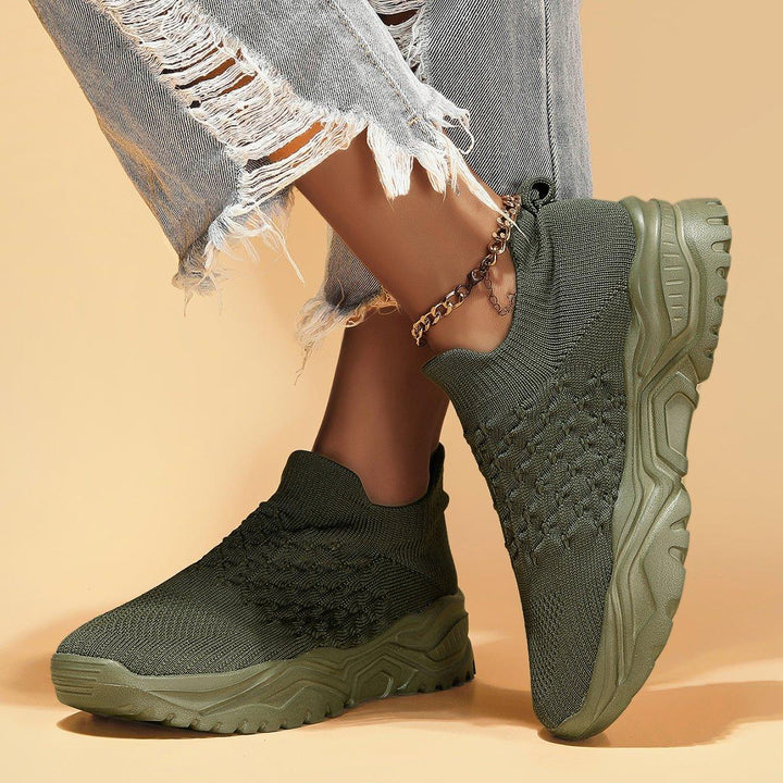 Close-up of the heel area of an olive green Ortho Cloud Slip-On, showing ergonomic design