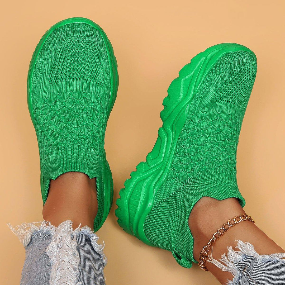Studio shot of the green Unisex Ortho Cloud Slip-On Shoes, highlighting their unisex appeal and comfort