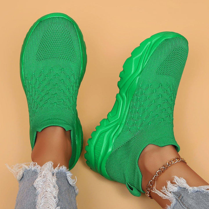 Studio shot of the green Unisex Ortho Cloud Slip-On Shoes, highlighting their unisex appeal and comfort