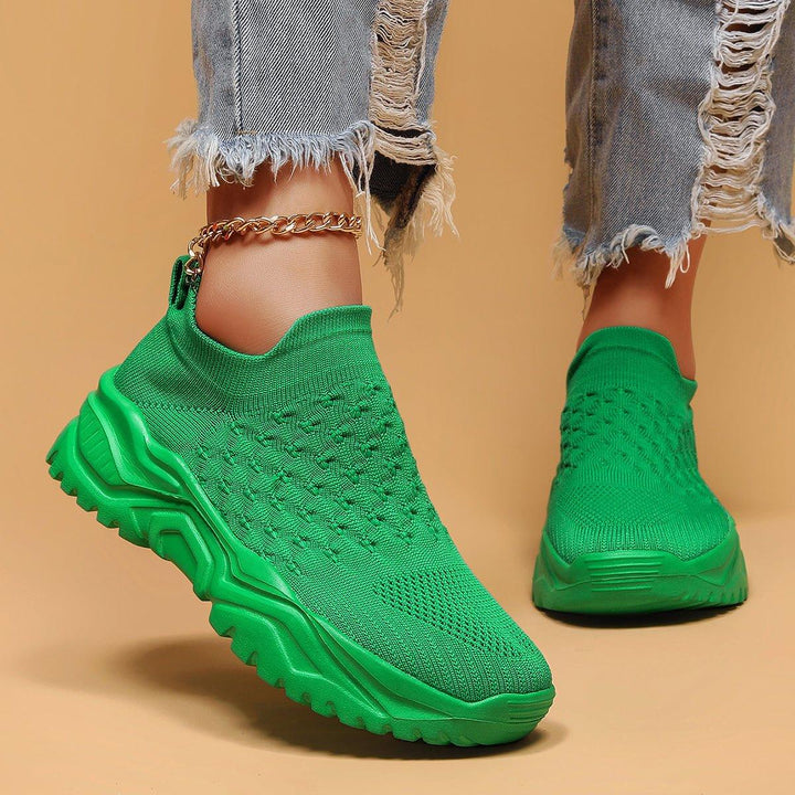Bottom sole of the green Unisex Ortho Cloud Slip-On Shoes, illustrating its non-slip grip pattern