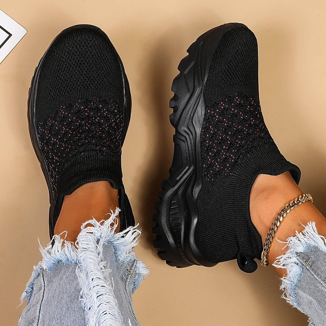 Comfortable Ortho Cloud Slip-Ons in black and pink polka dots, perfect for casual unisex wear