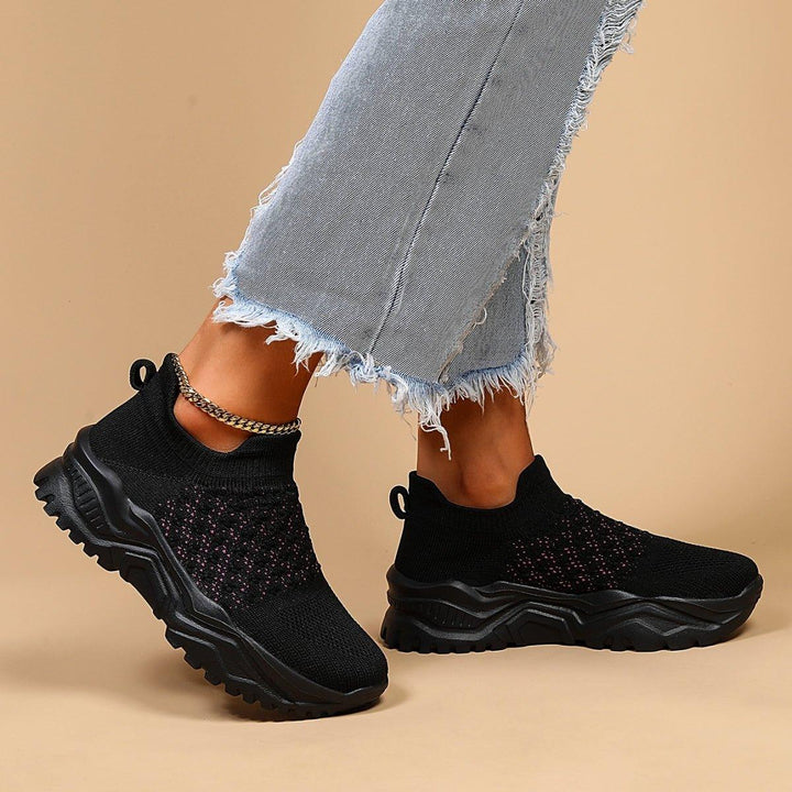 Ortho Cloud Slip-Ons, featuring black base with vibrant pink polka dots, comfort shoes