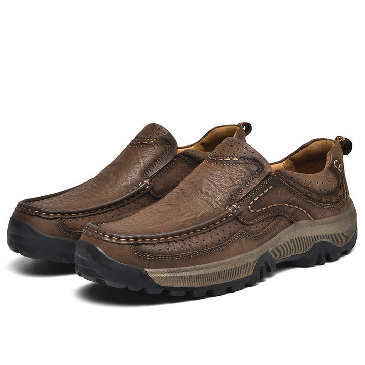 Close-up of the slip-resistant sole on black unisex comfort shoes for safety