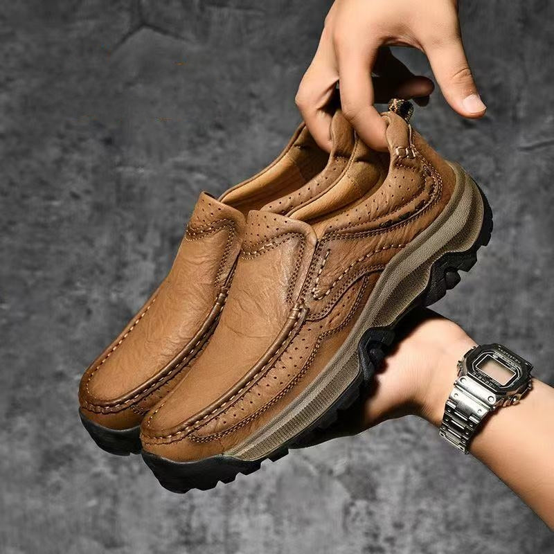 Frontal view of black orthopedic footwear, highlighting the spacious toe box
