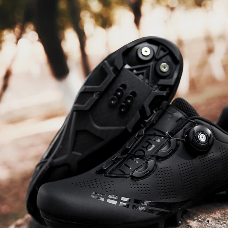 White unisex athletic cycling shoes, featuring an orthopedic design for comfort & performance in any cycling activity.