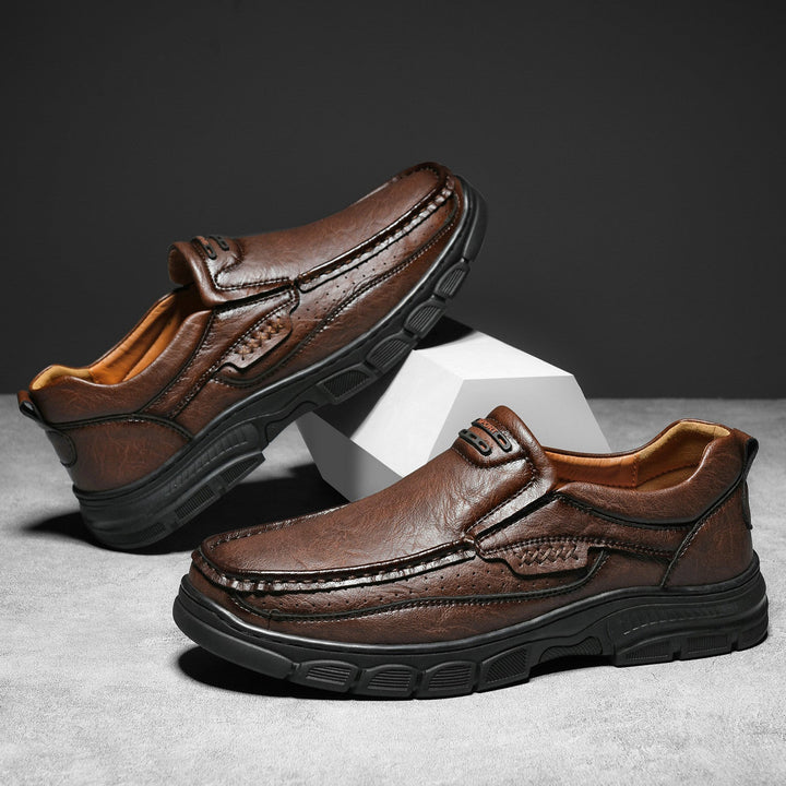Stylish leather orthopedic boots providing arch support for pain relief, suitable for men and women