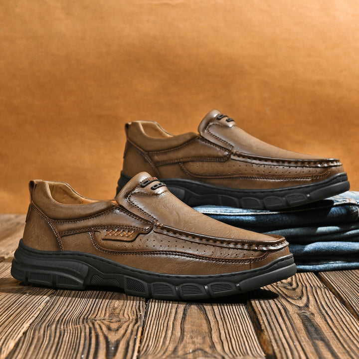 Pair of unisex orthopedic walking boots with advanced arch support and durable leather construction