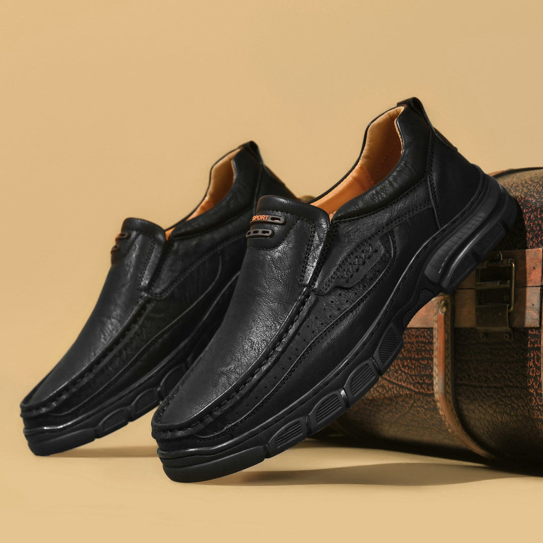Unisex leather boots with ergonomic arch support, designed for pain relief and all-day comfort