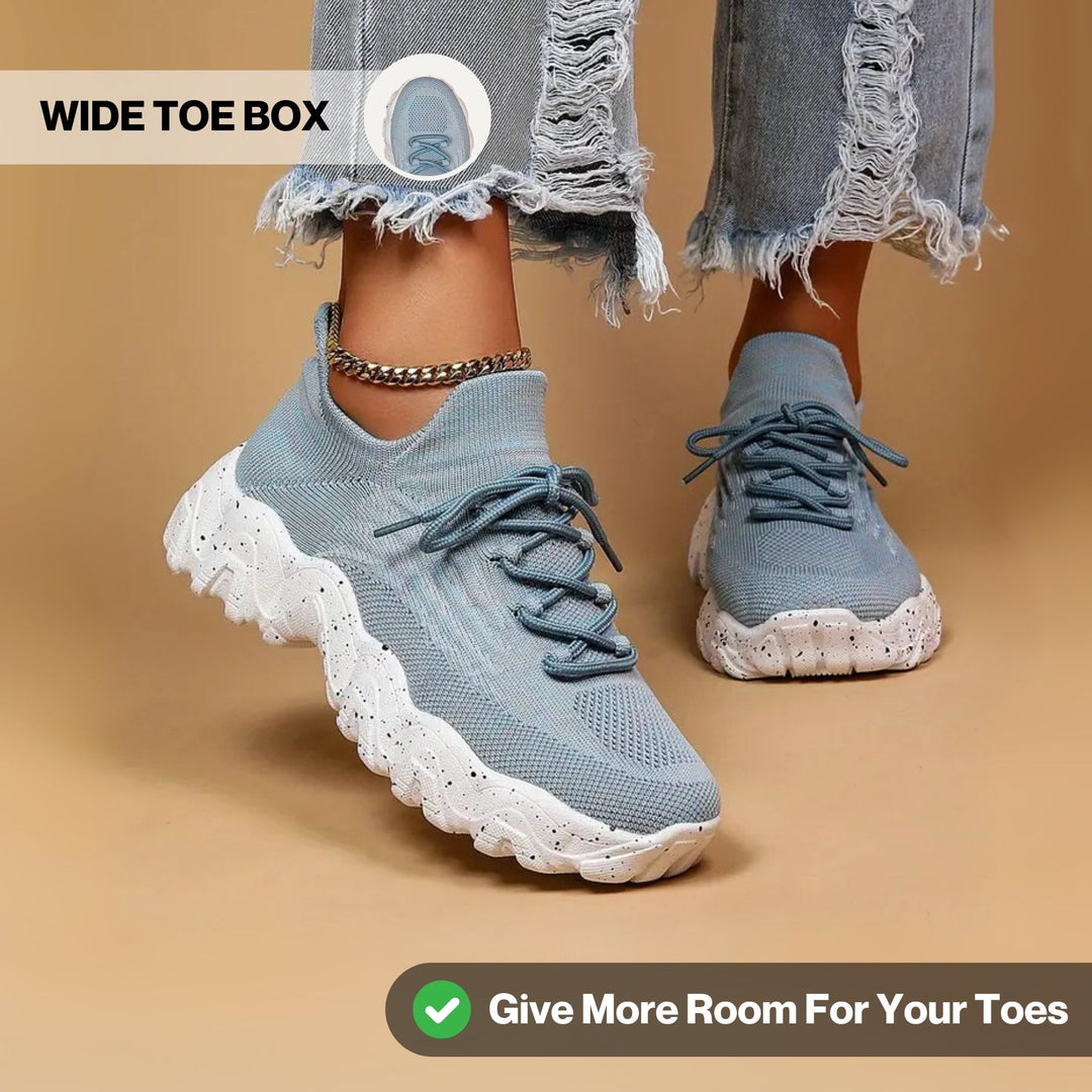 Pair of women's white orthopedic comfort footwear, ideal for sensitive feet and long wear