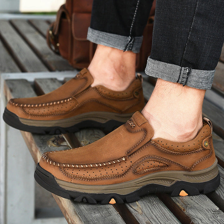 Unisex leather boots in a classic brown, orthopedic design for superior comfort and support.