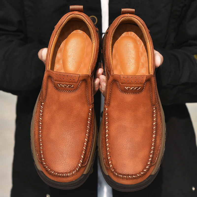 Pair of brown Unisex Orthopedic Transition Boots with laces, ready for everyday wear.