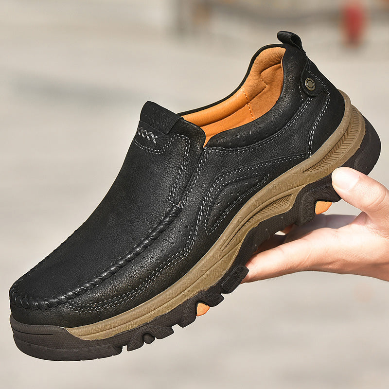 Model walking in black Unisex Orthopedic Transition Boots, showing their comfortable stride.