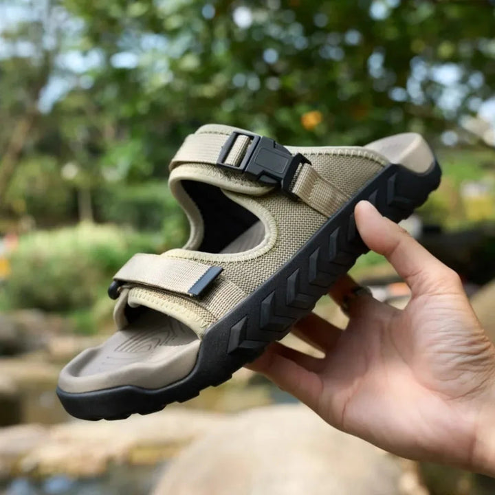Close-up of Unisex Outdoor Adventure Sandals, adjustable black straps, textured footbed