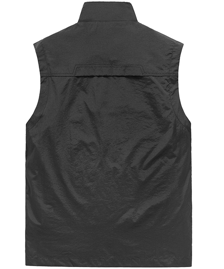 Beige unisex photography vest with many pockets, great for carrying equipment outdoors.