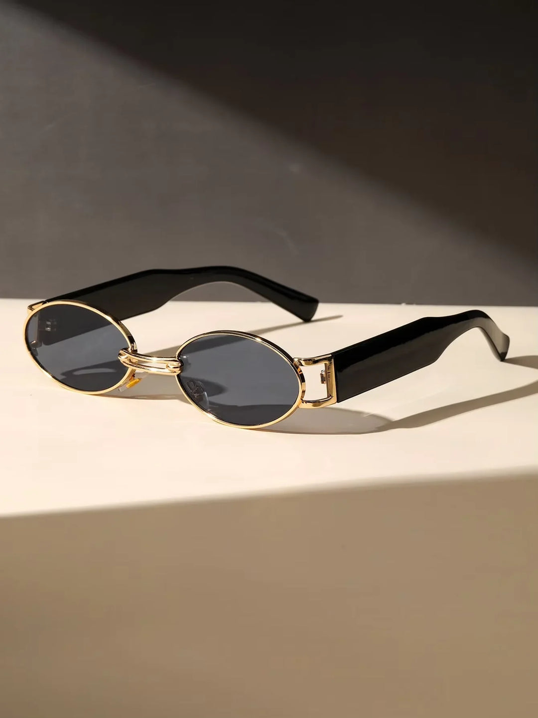 Unisex Oval Luxe UV400 Sunglasses, black frames, side view, protecting eyes from sun
