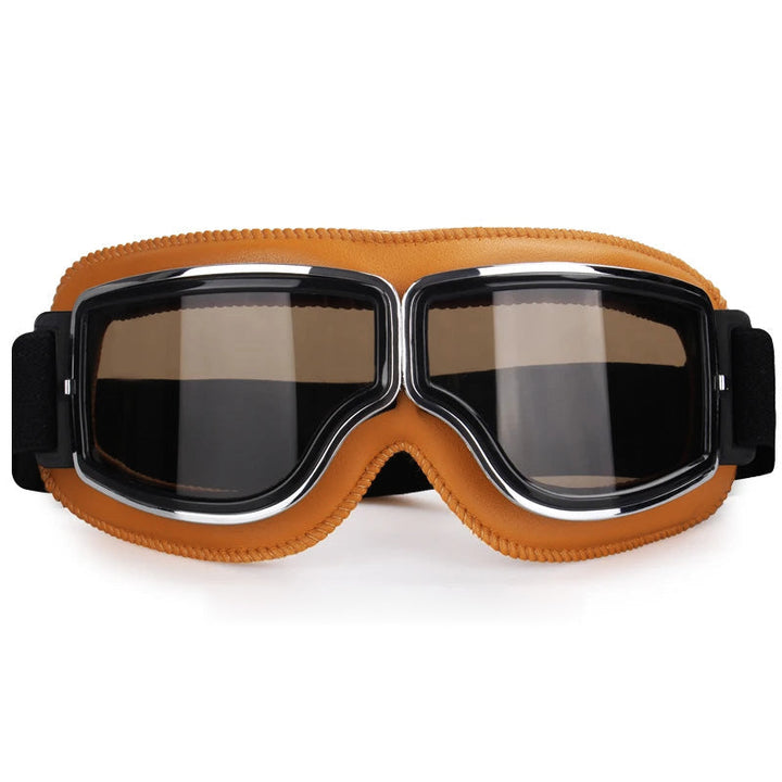 Protective cycling goggles, anti-fog & UV, compatible with helmets & fits over eyewear.