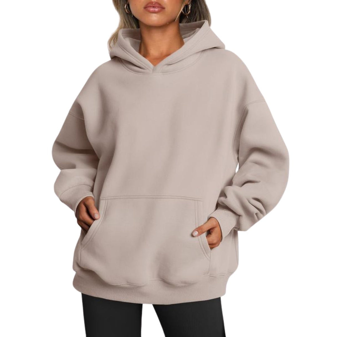 Relaxed fit of the unisex oversized hoodie, showcasing its comfortable design and soft cotton blend material