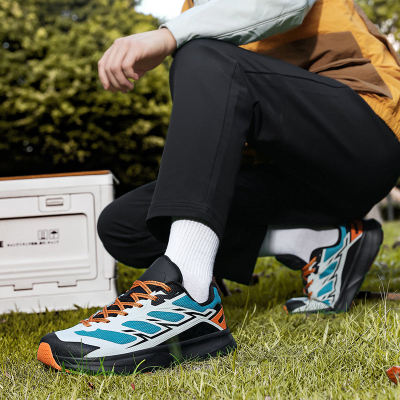 Close-up of the breathable mesh fabric on Unisex Performance Trail Running Sneakers, texture detail