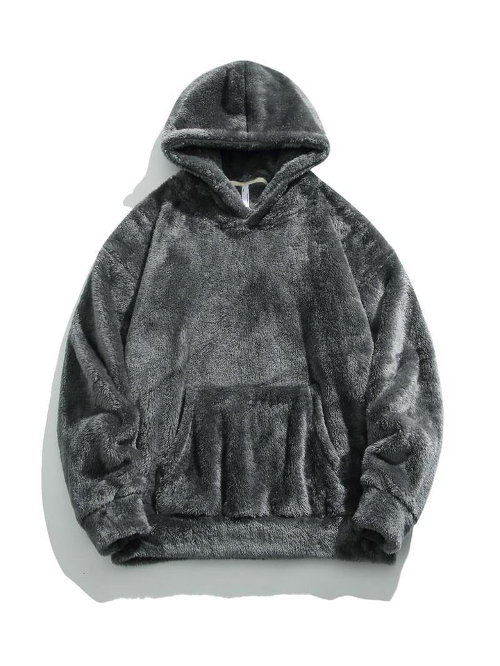 Close-up of the soft faux fur material of the fleece hoodie, emphasizing its comfortable and warm design.