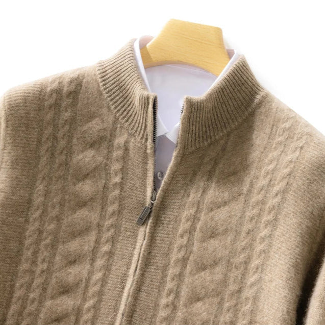 Close-up of the intricate cable knit pattern on a soft cashmere unisex zip-up cardigan.