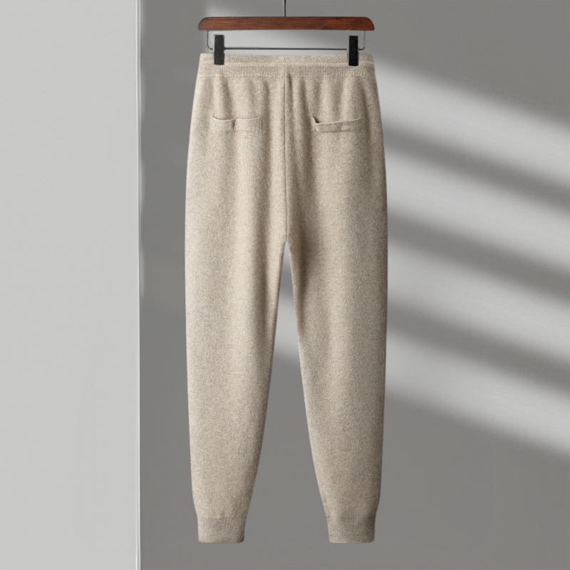 Close-up of premium merino wool fabric on black joggers, highlighting softness and quality