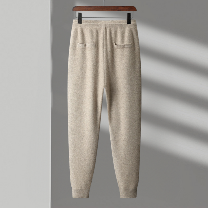 Close-up of premium merino wool fabric on black joggers, highlighting softness and quality