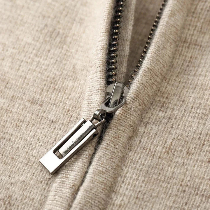 Close-up of the soft knit texture of a premium cashmere zip up hoodie, showing quality