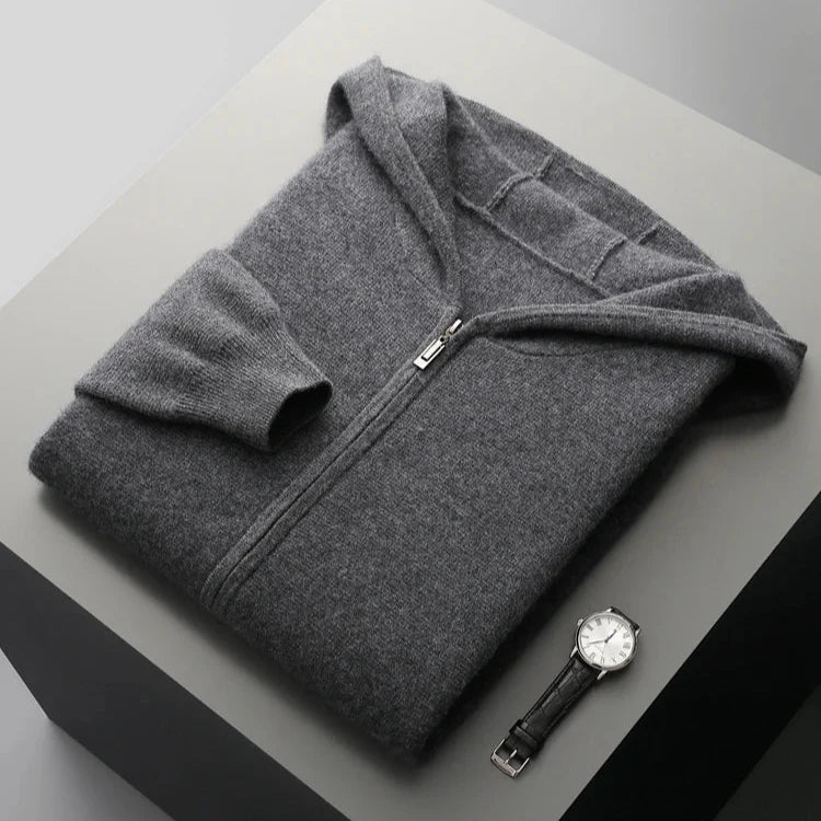 Stack of folded premium cashmere full-zip hoodies in various colors, luxury loungewear