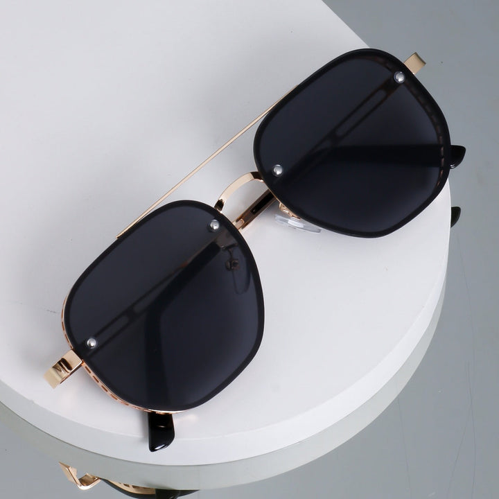Detailed image of the hinge on unisex retro oval sunglasses, highlighting quality construction and UV400.