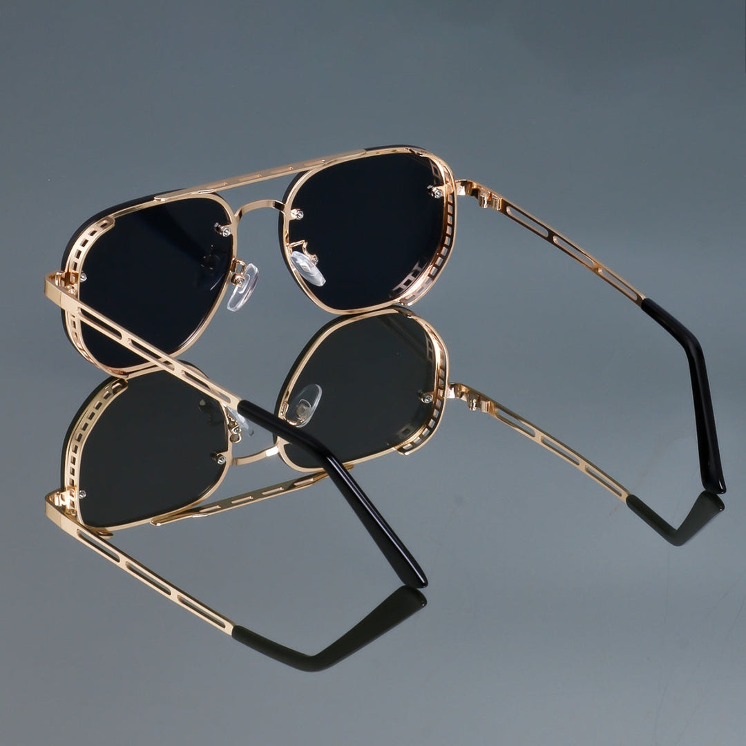 Unisex retro oval sunglasses by a beach, symbolizing summer essentials and reliable UV400 protection.
