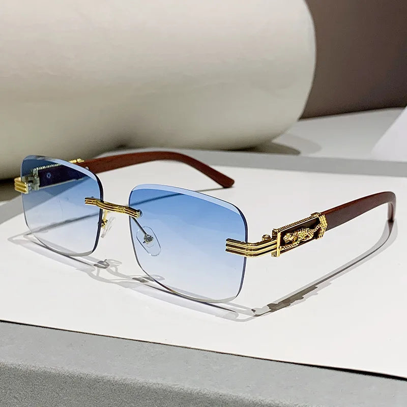 Unisex rimless gradient sunglasses with UV400 protection and stylish wood arms, perfect fashion eyewear accessory.