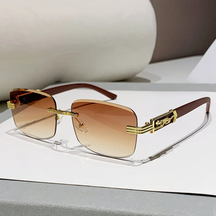Fashionable unisex rimless gradient UV400 sunglasses featuring sleek gold detail and natural wood arms.