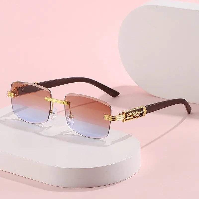 Lightweight UV400 gradient rimless sunglasses for unisex wear, showcasing elegant wood arms and gold accents.