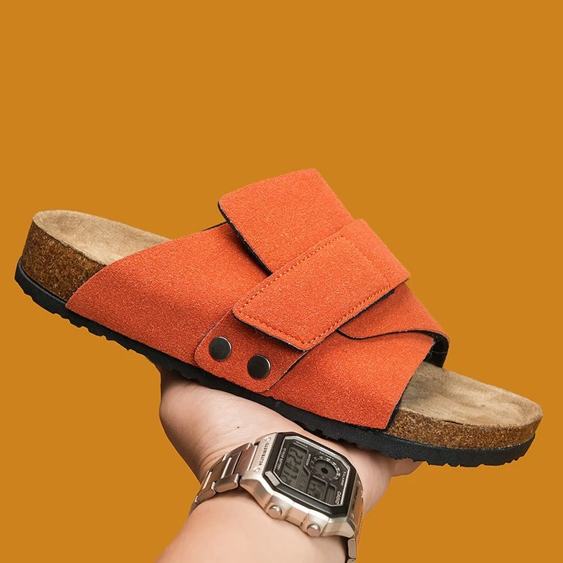 Arrangement of multiple Shoreline Comfort Slide Sandals, showing various color options for summer.