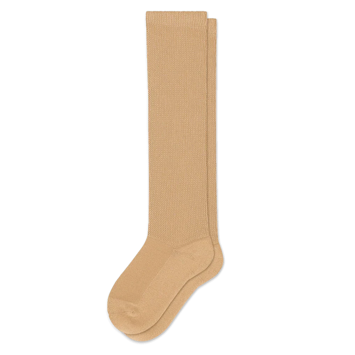Unisex tan compression socks, ideal for circulation support and everyday comfort.