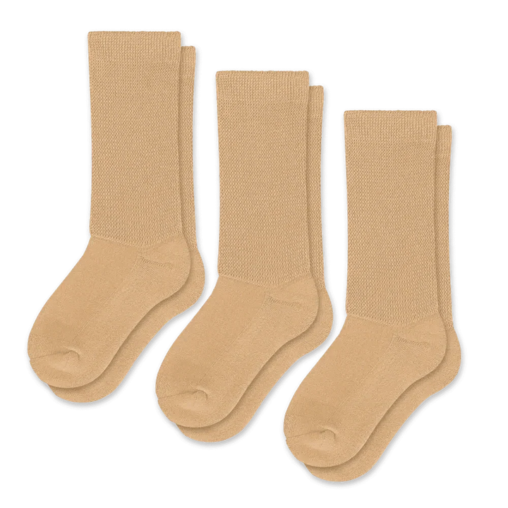 Tan compression socks, a unisex design offering therapeutic circulation benefits.