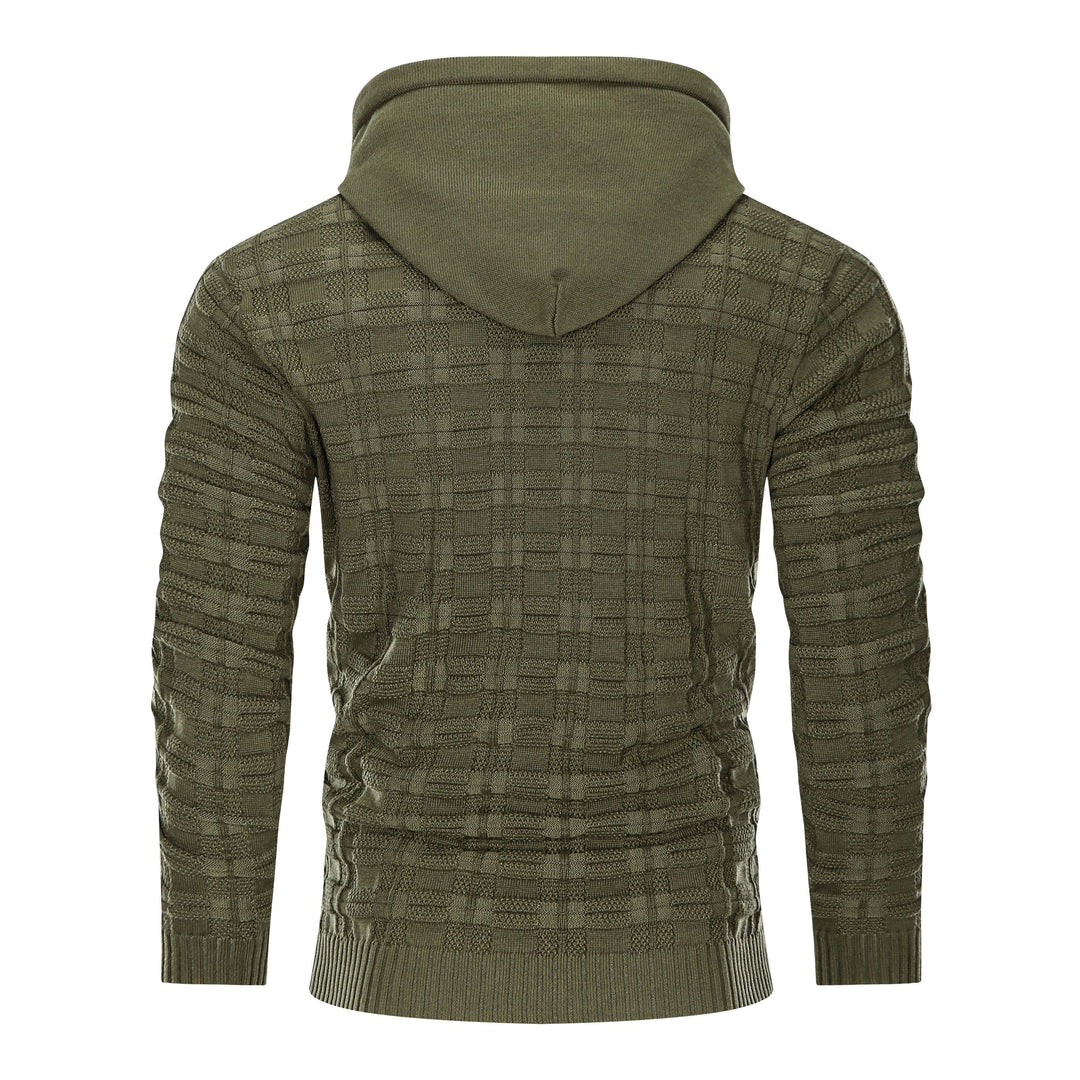 Unisex textured pullover hoodie in a studio setting, showcasing its quality and design.