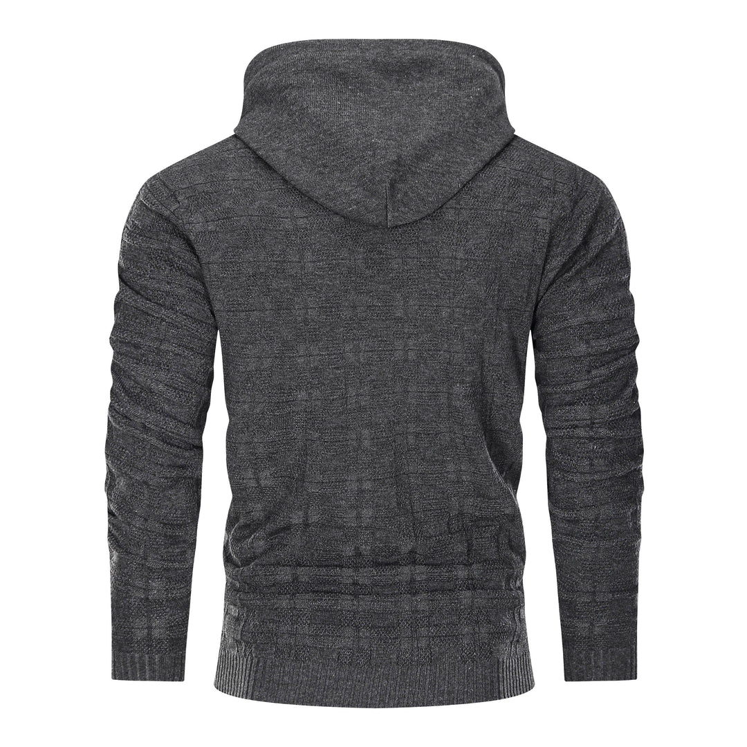Unisex textured hoodie with a minimal design, a versatile cotton blend pullover for any wardrobe.