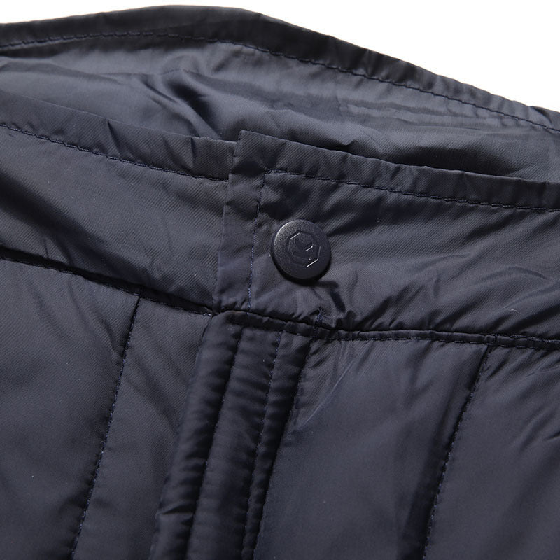 Model wearing black unisex thermal duck down pants, showcasing fit and windproof design for winter.