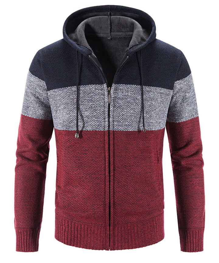 Model wearing a tri-tone knit performance hoodie, demonstrating its casual yet athletic appeal.