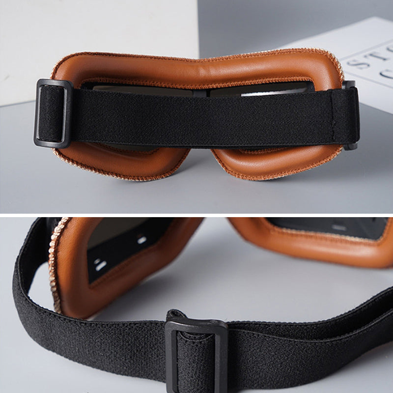 Vintage motorcycle goggles mounted on a classic open-face helmet, ready for adventure & eye protection.