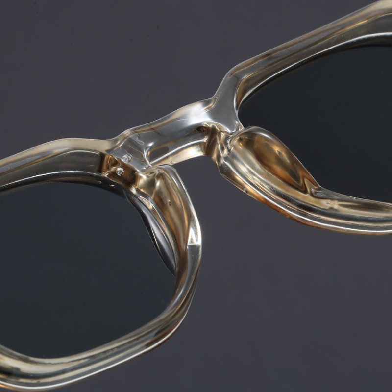 Close-up of unisex vintage square UV400 sunglasses, showing quality acetate material and design