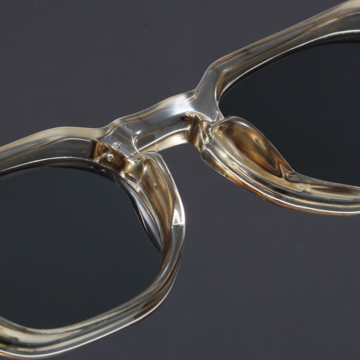 Close-up of unisex vintage square UV400 sunglasses, showing quality acetate material and design