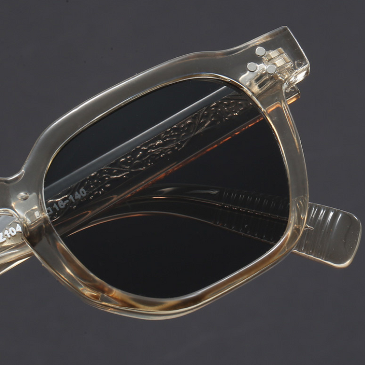 Studio shot of unisex vintage square sunglasses on a white background, emphasizing UV400 protection