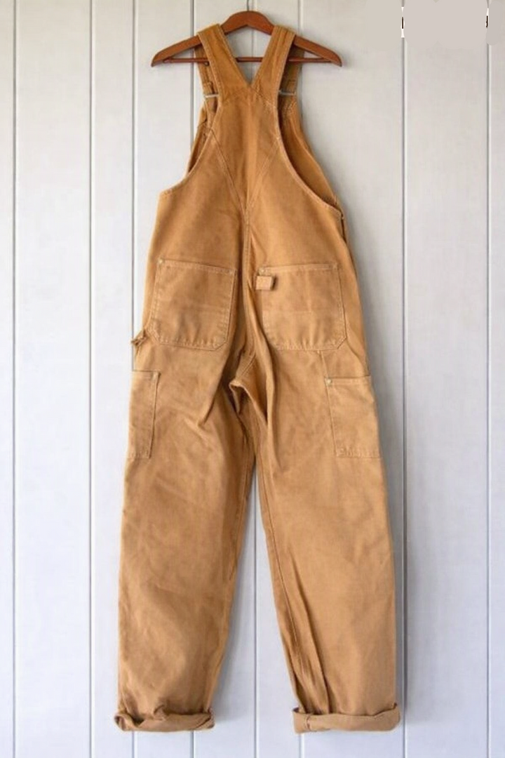 Unisex vintage-style bib overalls offering a relaxed, comfortable fit with adjustable straps for versatile everyday fashion.