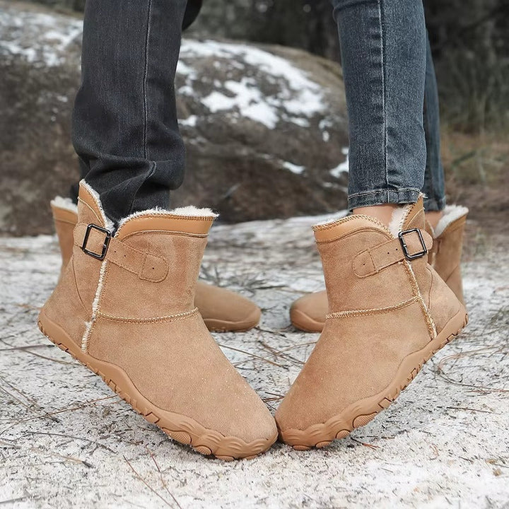 Unisex winter boots with wide toe box, flexible sole, perfect for cold weather.