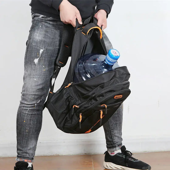 Durable waterproof travel backpack, ideal for flights, road trips & outdoor adventures; multi-compartment design.