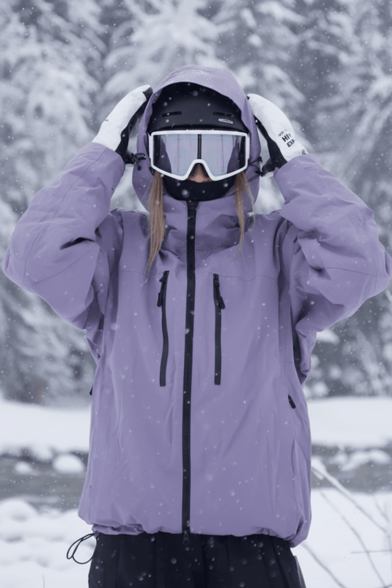Back view of the Jesse unisex snowboard jacket, showing weather-resistant fabric and ergonomic design for winter adventures.